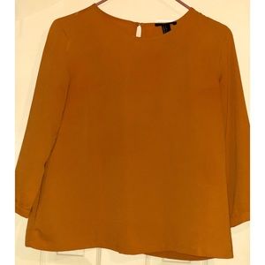 Boxy 3/4 sleeve button closure top